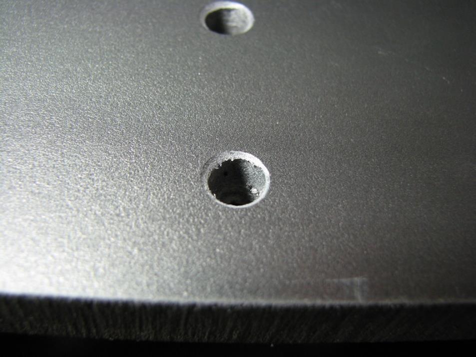 21) Drill the 8 holes with the 1/4" drill bit. Countersink the holes lightly to finish off the holes (optional).