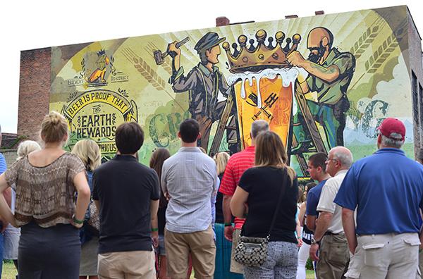 ArtVenture tour at the Beer Is Proof mural. Photo: Scott Besler This year, Cincinnati hosts the NAACP Convention in July, for which they are developing a Civil Rights history-focused itinerary.