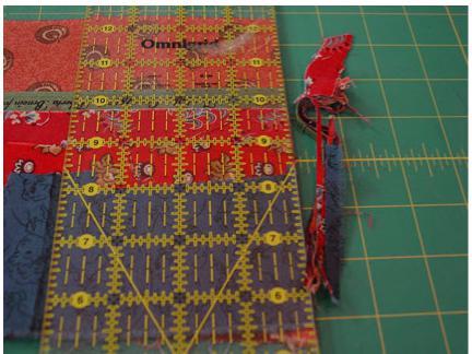 for another string piecing project or might possibly be used for a piano key border like I made for the light webs.