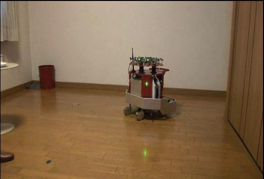 The mobile robot is given the recognized verbal command with sound position information from a ceiling microphone