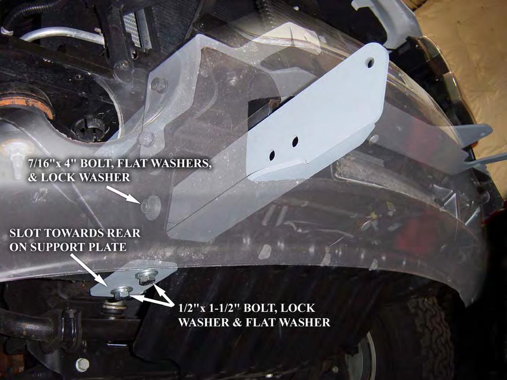 Reinstall plastic air baffle. The air baffle will be angled down and tight against bottom of W-Plate. Reinstall grille. 8. Install the Frame Extension as shown in Figure 6.