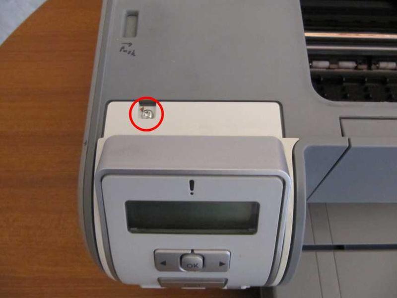Remove the paper guide from the rear of the printer.