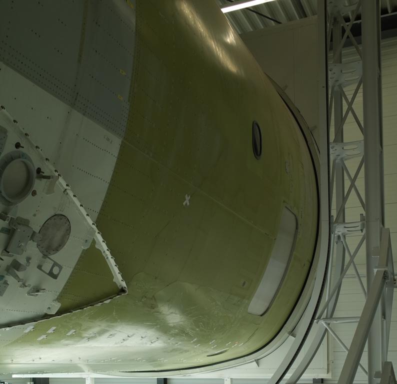 For the second campaign the fuselage was closed using foam absorber elements. These elements are attached to a rigid frame affixed to the testing hall in which the fuselage demonstrator is located.