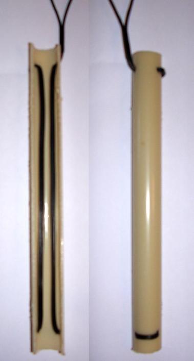 1.3 Capacitive sensor theory A simple capacitive sensor can be created by running a wire-pair running up and down the inside of a plastic tube, see Figure 1.3. Such a sensor can be used to measure the level of a substance inside the detector.