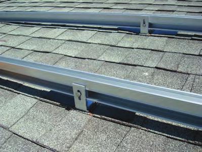 SnapNrack TM SERIES 100 ROOF MOUNT INSTALLATION manual 9. Level rails 9.1 Overview Rails can be leveled by raising or lowering the points where they attach to the L-foot or standoff assembly.