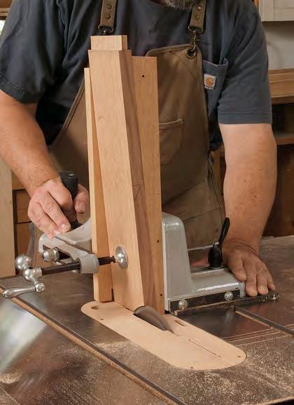 Start by cutting the side rails to length with the wedge screwed to the crosscut sled so that the rail ends are angled to match the splay angle.