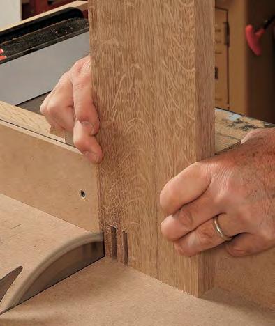 Use a bearing-guided straight bit to cut the shoulders.
