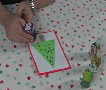 1 1. Christmas Tree Card 1) Take out an Orange sheet of Fluro Art Card and fold it in half. 2) Cut a sheet of cartridge paper so that it sits 5mm inside the perimeter of the Orange card.