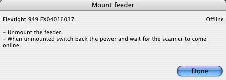 6. When you have removed the holder, click Continue in the Mount feeder window. The scanner then shuts down. 7. The Mount feeder window updates with new instructions.