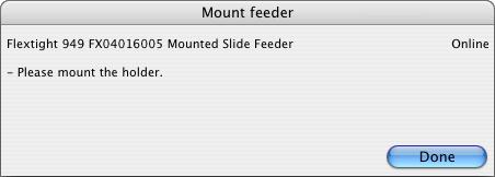 12. FlexColor detects that the scanner has been turned back on. The Mount feeder window updates with new instructions. Click on Continue in the Mount feeder window. 13.