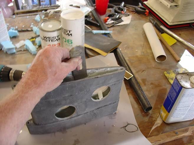 Removing the peel ply / cloth and boring the pintle hole Use a plane blade or knife (and a lot of cussing)