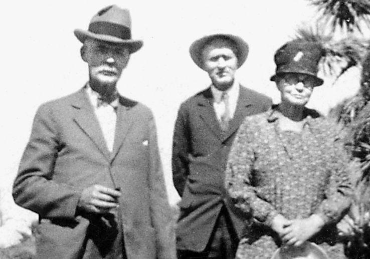 Ira standing between his parents Vallejo and Addie Kinyon, on an outing to the Mojave Desert about 1932. This picture was taken during the short time that Ira and Clem lived in Los Angeles.