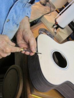 Do be sure to reveal the entire truss rod slot, as the truss rod end exposed from