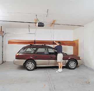 Check distance between ceiling and top of garage door in open position. Will object fit in this space? If not, will object lift and store under garage door in open position?
