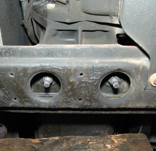 Remove stock front metal skid plate and intermediate plastic skid plate. Use a floor jack or transmission jack and position it under the transmission pan.