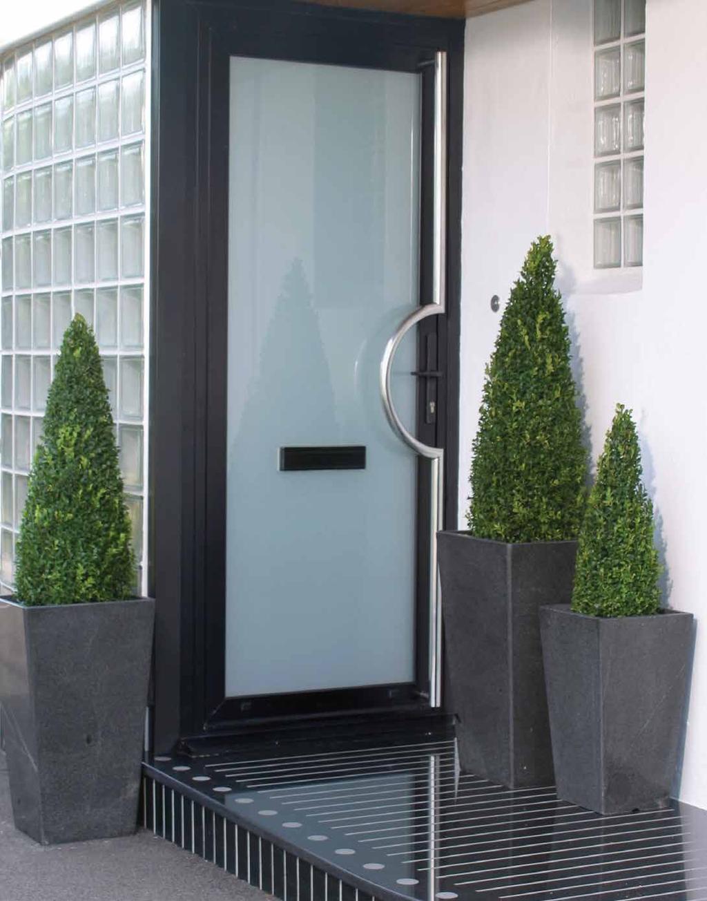 modern garden. The planters are made from cut slabs of solid granite polished to a midshine.