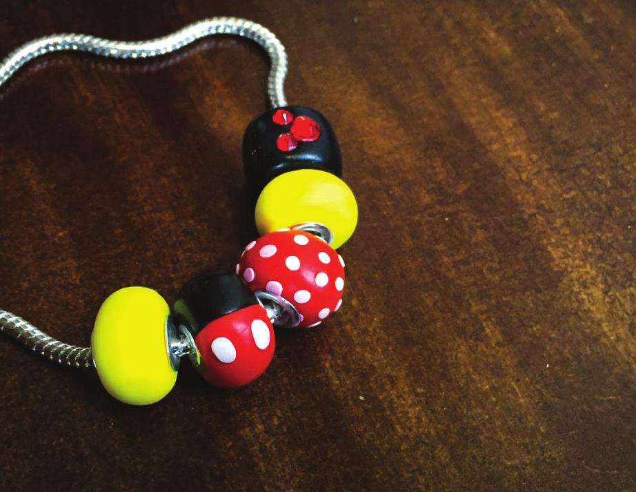 MICKEY & MINNIE BRACELET Pair the Mickey and Minnie with two yellow shoe beads and