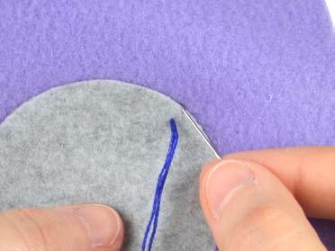 Bring the needle up at the beginning of your seam, about ⅛-¼ inside the applique shape. 2.