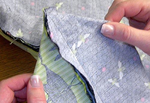 The two seam allowances should fold opposite one another. This will help you align the seams.
