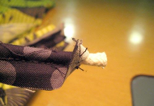 Cut the cord back 1½" from each end - do not cut the fabric.