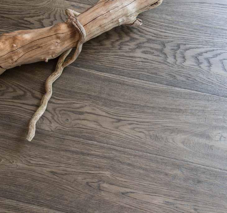 This floor s tactile surface is planed by  WATER MEADOW LS103 Handscraped, Distressed, Stained & Hardwax Oiled MOORLAND