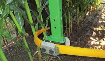 Hardwearing synthetic tactile sensors carefully and precisely touch plants in closed row crops (e.g. corn) and guide the vehicle with highest accuracy.