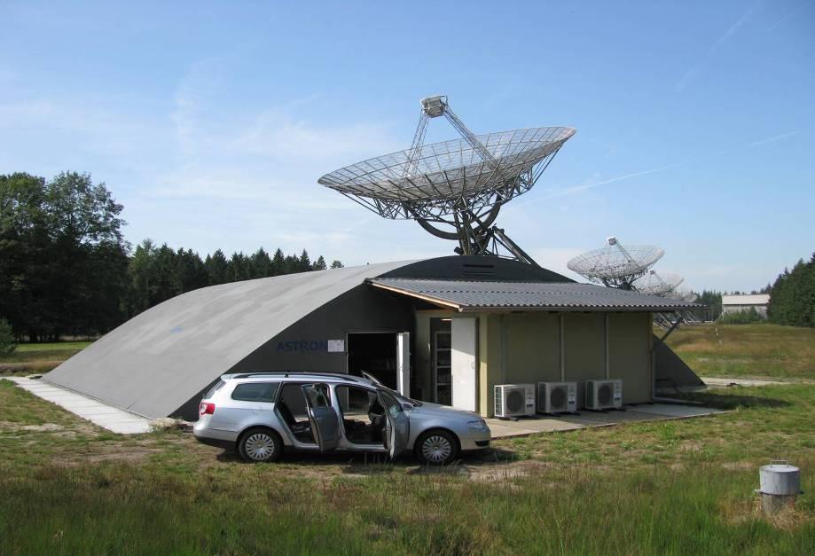 Figure 53: Westerbork EMBRACE station, a large curved radome and shielded processing shelter. A picture of the array inside the radome is given in Figure 54.
