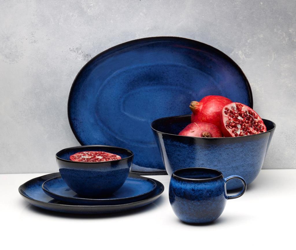 Mikasa Shea Blue dinnerware boasts a striking cobalt hue, sure to beautify any meal you serve on it. Featuring a subtle reactive glaze finish, it s edged in black to further the dramatic effect.