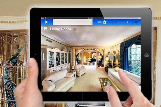 Graceland Visitors explore Elvis Presley's former home using an ipad that interacts with beacons strategically placed around the mansion.