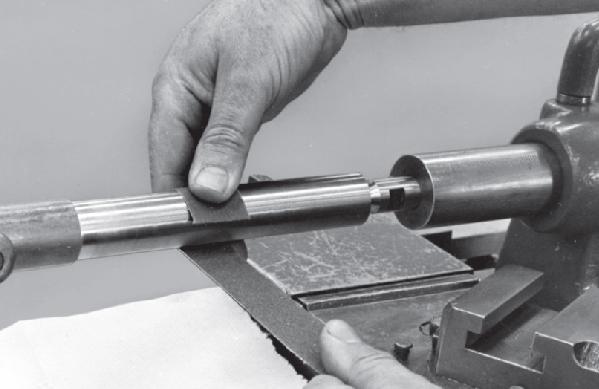Use the Vernier caliper to check the depth of the hole as shown. Fig. 6.66. 6. Polishing Polishing is a finishing operation performed on the workpiece to improve the surface finish.