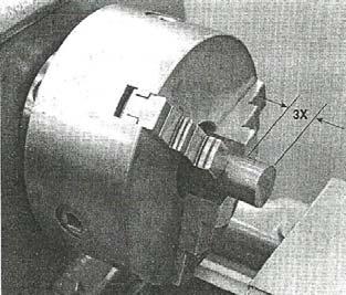 It's good practice to tighten the jaws from all 3 chuck key positions to ensure even gripping by the jaws. Fig. 5.41 Fig. 5.41: Workpiece mounted in three jaw chuck 3.