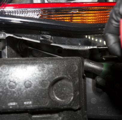 From underneath the vehicle, remove the driver side intercooler outlet