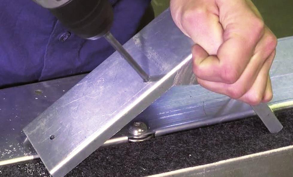 71. Using a small diameter drill bit, drill a pilot hole for each mark. You can use this pilot hole to double-check that all your holes align with drawer s pre-cut holes.