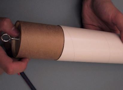 3) Insert the coupler into the end of the tube up to the half-way mark on the coupler.
