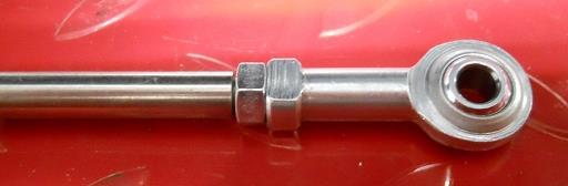 Thread an M6 Nut and a Spherical Rod End onto the RIGHT hand threaded end of