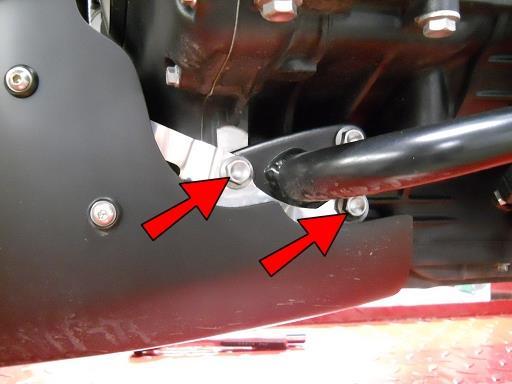 Go to the shifter side and remove only these 2 bolts and remove the