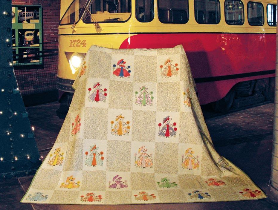 The theme Generations, refers to a quilt started by a Barbara Mecklenburg s Sunbonnet quilt is displayed in front of a 1949 trolley, a common site in Pittsburgh until they were taken out of service