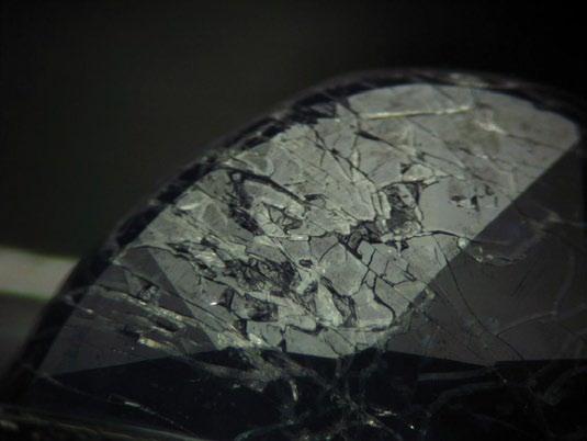 18 Figure 14. X-ray image of the new generation cobaltdoped glass-filled sapphire (left), showing opaque areas along the fractures.