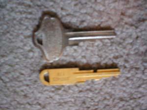 Here we have the Factory original rekeying tool and a change key for a Titan lockset.