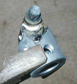 bead looks much like a sweated copper plumbing pipe joint. The bead should be visible and uniform on both sides of each soldered joint. That's hardened flux that has flowed below the pin.