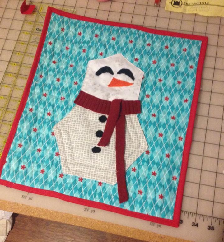 The quilting was very fast since the piece is only 14 x 16. I just quickly stitched some wavy vertical lines on the background.
