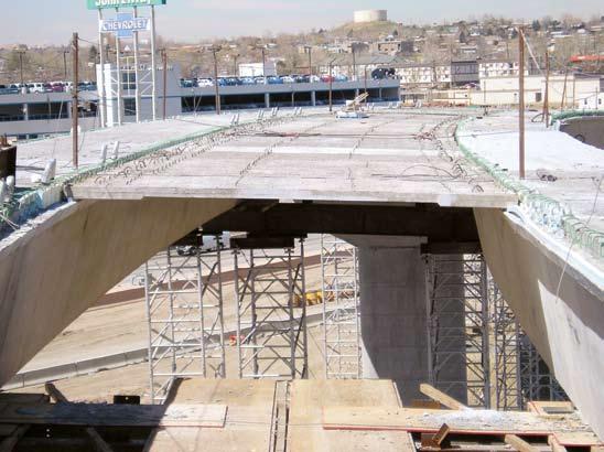 38 Precast concrete panels span the opening between the curved U-beams. The final roadway was cast on top of the panels and girders.