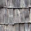 Real cedar shingles must be stained or bleached to prevent discoloration. These treatments will need to be repeated over time.