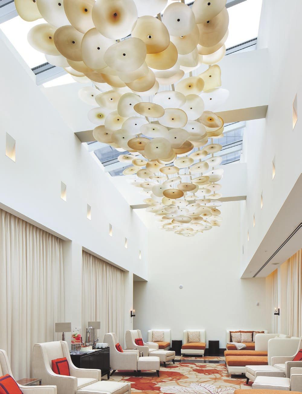 Enso Chandelier Located at the Ritz-Carlton Spa in Toronto Ontario, this glass installation consists of 259 hand blown glass discs suspended below a skylight. 2.75m X 12m.