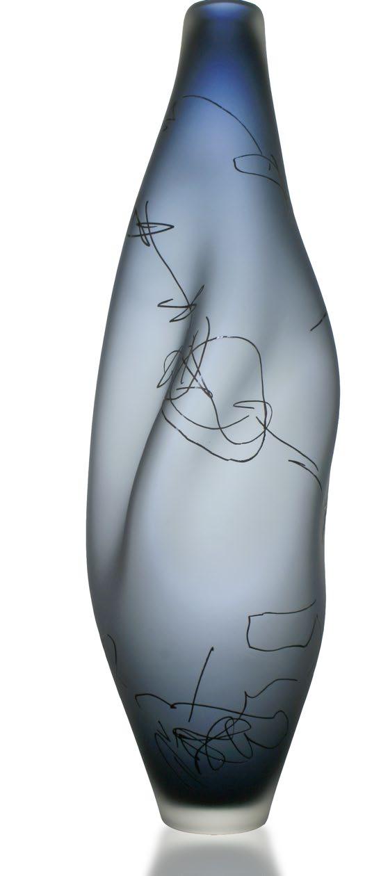 Scribe Vase The Scribe Vase has natural folds that are created during the blowing process. Each piece is one-of-a-kind. The frosted finish enhances the natural curves and luminescence of the glass.