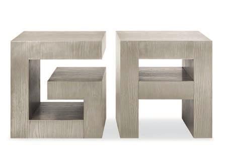 TOMMY Small G- and A-shaped tables in wood with different finishes.