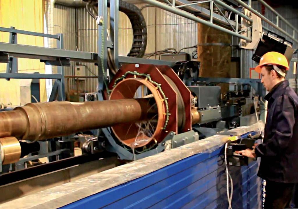 UMPK-38 SYSTEM FOR MAGNETIC PARTICLE TESTING AND FLAW DETECTION OF RAILWAY AXLES PURPOSE The system is intended for magnetic particle testing of railway axles during their production (at axle