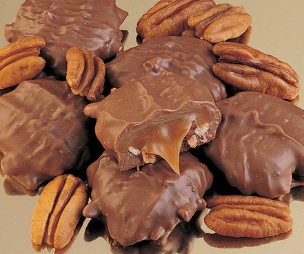pecans are covered in caramel then drenched with creamy milk