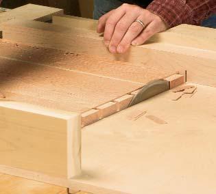6-4). In this case, my decision to expose the dovetails at the top of the case required a molding applied around the edges of the top, which in turn required an extra drawer attached behind that top