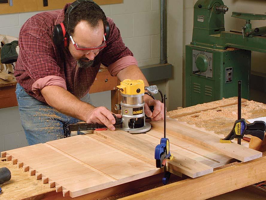 USE A JIG TO ROUT DADOES AND DOVETAILED SLOTS Router jig aligns carcase dadoes. The simple jig made from 4-in.-thick poplar is sized to fit your router s base.
